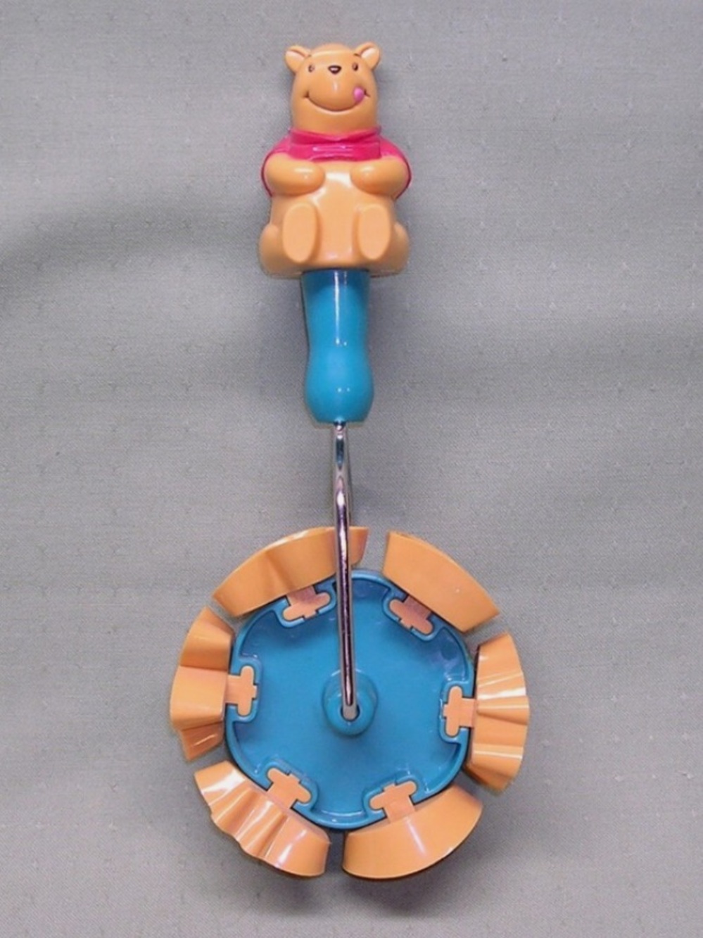 Winnie the Pooh Roller Cookie Cutter by Wilton for Disney, dated 1992